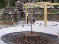 Millstone paver with charcol solider course
